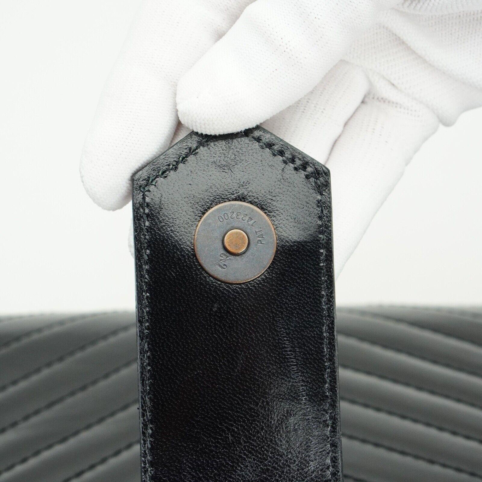 Saint Laurent Quilted Leather Clutch Bag Black - Lost Designer